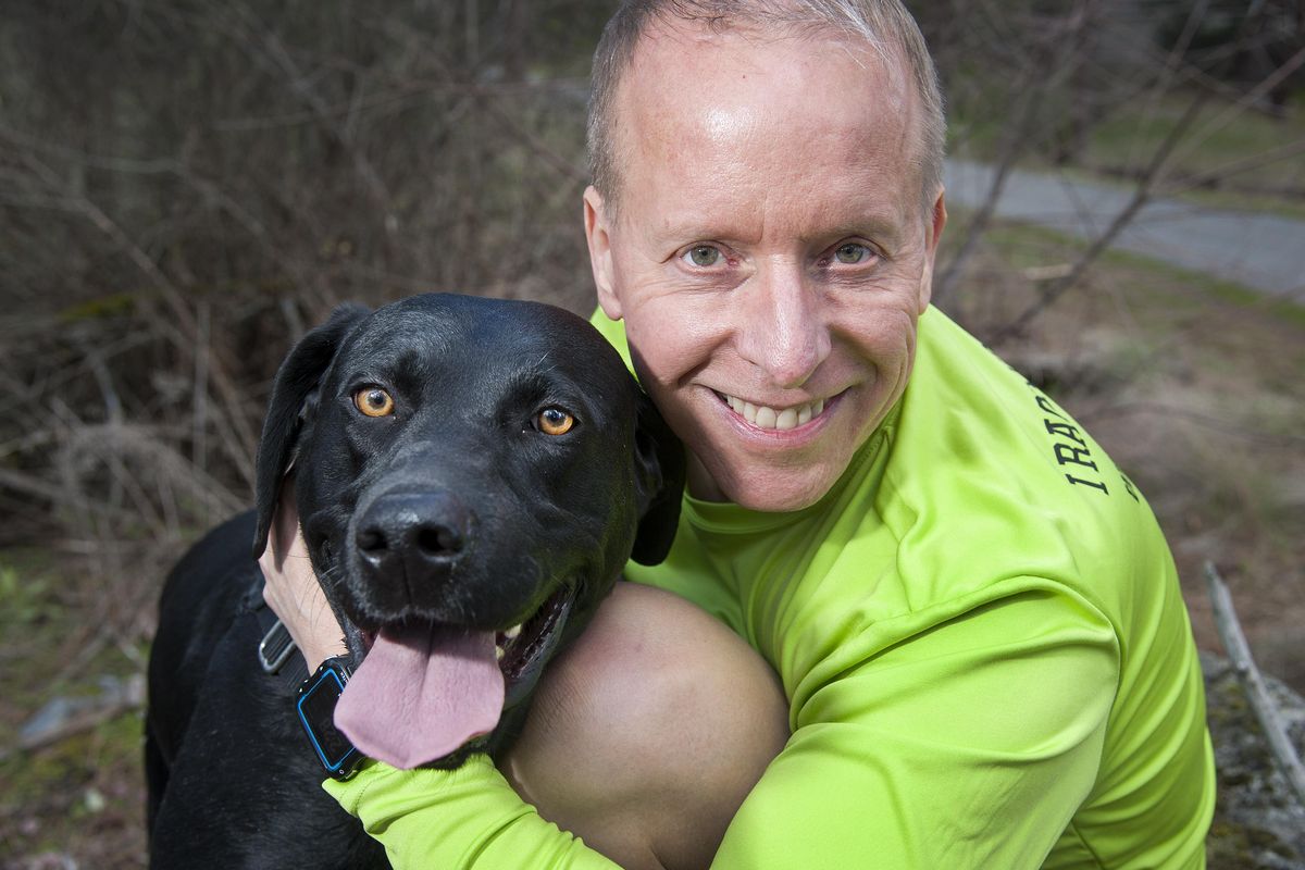 Eric O’Grey and his dog, Jake. (Dan Pelle / The Spokesman-Review)