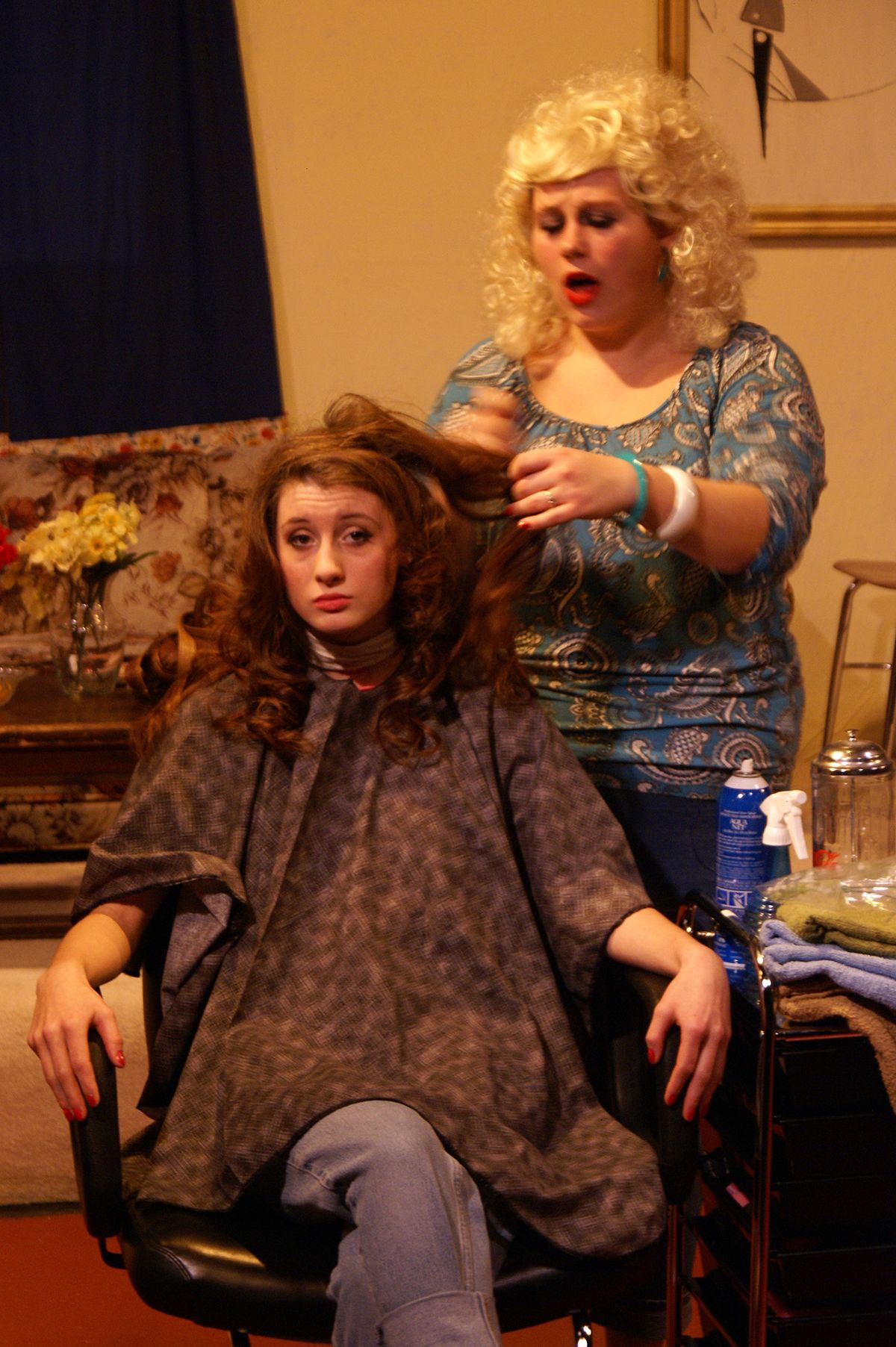 In North Central High School’s production of “Steel Magnolias.” Kailee Theisen, seated, plays Shelby and Karli Pound plays Truvy.