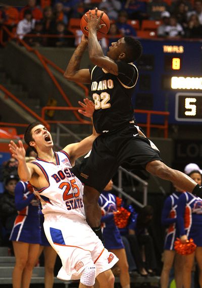 Idaho's Kashif Watson (32) shoots over Boise State's Paul Noonan (25 during the second half of an NCAA college basketball game on Saturday, Feb. 6, 2010 in Boise, Idaho. Idaho went on to win 79-55. (Matt Cilley / Fr117486 Ap)