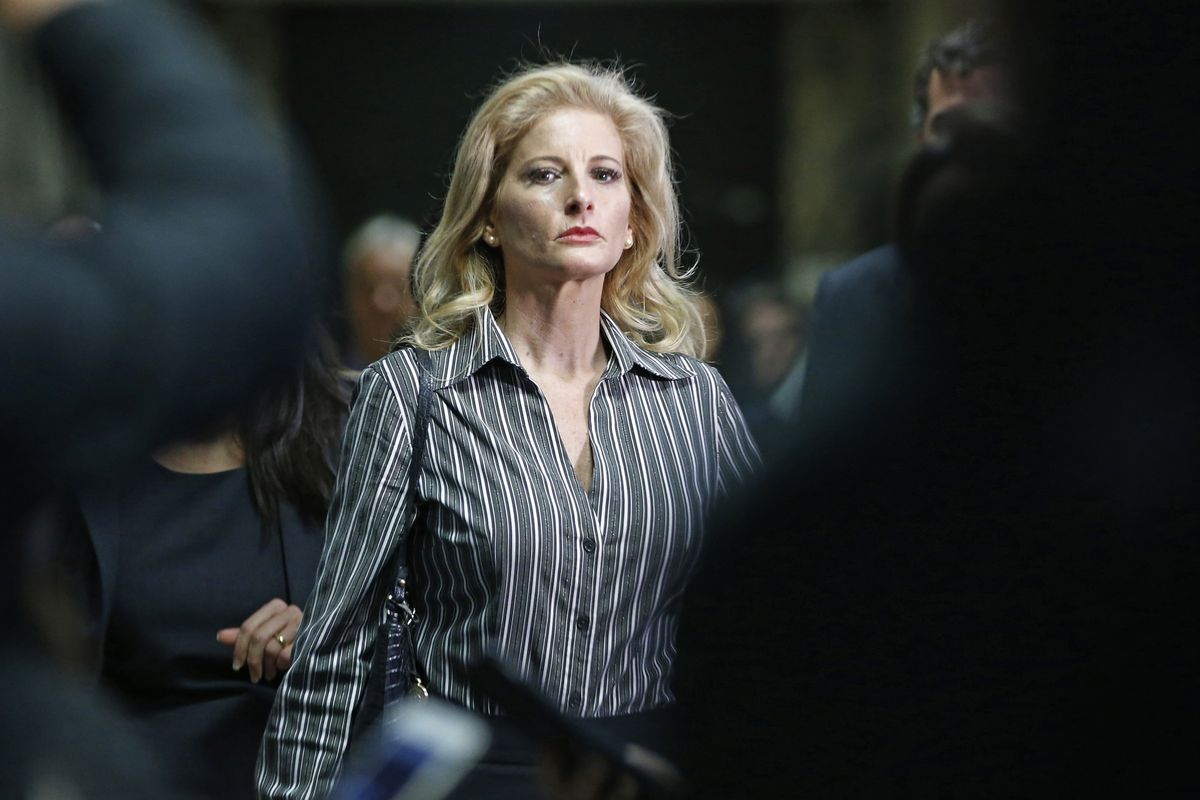 FILE - In this Dec. 5, 2017, file photo, Summer Zervos leaves Manhattan Supreme Court at the conclusion of a hearing in New York. The former "Apprentice" contestant is trying to get her defamation lawsuit against former President Donald Trump moving again now that he