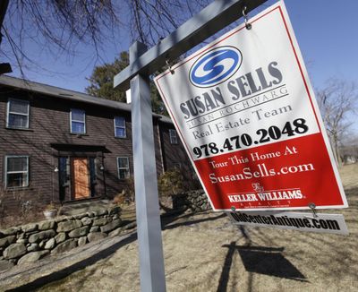 A home is shown for sale in North Andover, Mass., on Monday. Sales of previously occupied U.S. homes rose in January to the highest pace in nearly two years. (Associated Press)