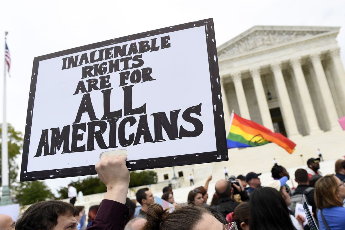 Protesters gather outside the Supreme Court in Washington where the court heard arguments in the first case of LGBTQ rights since the retirement of Justice Anthony Kennedy in November 2019.  (Susan Walsh)