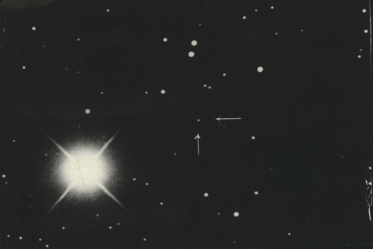 The bounds of human knowledge were pressed back just so much further by the discovery of a new planet, March, 1930. This photo of Pluto (the name given to the planet) was taken through a 24-inch telescope at the Lowell Observatory, Flagstaff, Ariz., by Dr. C.O. Lampland. (Associated Press)