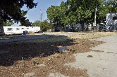 
A burned- out mobile home at  Rose Haven has been hauled off, leaving an empty space. 
 (Liz Kishimoto / The Spokesman-Review)