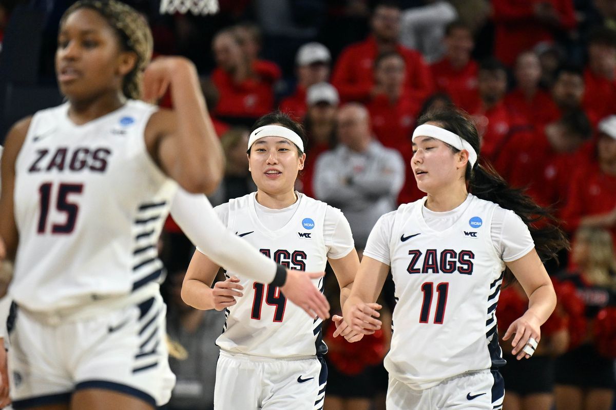 Gonzaga guards Kaylynne Truong (14) and Kayleigh Truong (11) take the court during the second half of Monday’s NCAA Tournament home game.  (COLIN MULVANY)