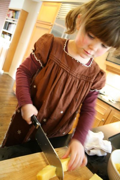 With supervision, even very young children can help make meals.  (Megan Cooley)