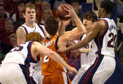 
Pepperdine's Michael Gerrity is surrounded by Gonzaga defenders in the Zags' 102-73 rout of the Waves on Saturday. Gonzaga faces Loyola Marymount tonight at the McCarthey Athletic Center. 
 (Christopher Anderson/ / The Spokesman-Review)