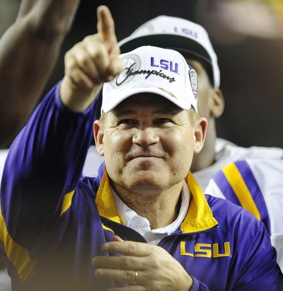 Coach Les Miles’ LSU Tigers beat Georgia in the SEC championship to earn a berth in the BCS title game. (Associated Press)