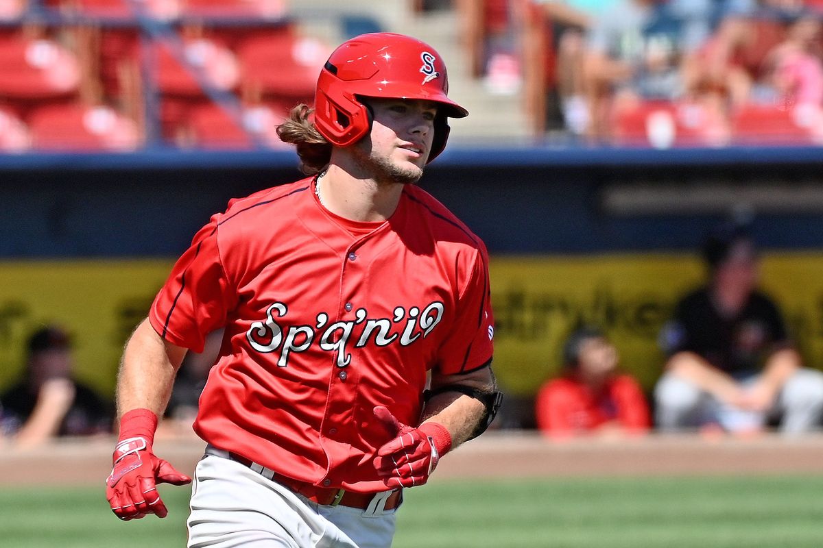 Spokane Indians second baseman Meeo Gil (16) runs the bases after hitting a how run against the Vancouver Canadians during a NWL baseball game at Avista Stadium on Sunday Aug. 24, 2022 in Spokane WA.  (James Snook/For The Spokesman-Review)