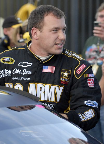 Ryan Newman exits his car after winning the pole for the Coca-Cola 600.  (Associated Press / The Spokesman-Review)