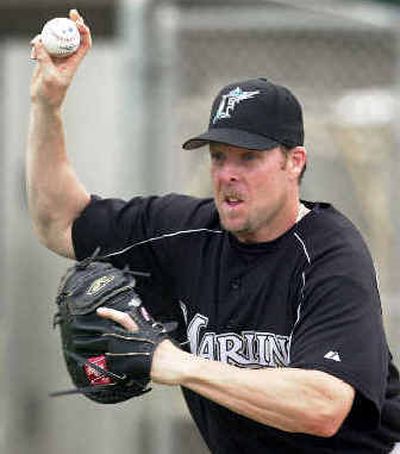 
Spokane's Mike Redmond, who completed his tenure as the primary backup with the Florida Marlins, will be part of a catcher-by- committee approach with the Minnesota Twins this season. 
 (File/Associated Press / The Spokesman-Review)