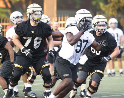 Defensive lineman Aikeem Coleman (97), shown during practice earlier this month, is expected to be among the leaders of the Idaho defense this season. (Jesse Tinsley / The Spokesman-Review)