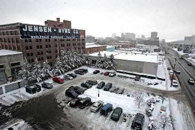 A five-acre land parcel, whose centerpiece is the historic Jensen-Byrd building on Spokane Falls Boulevard, has been offered to developers by Washington State University. The parcel stretches west and south of the parking lot in the foreground.
(Christopher Onstott/Spokesman-Review / The Spokesman-Review)