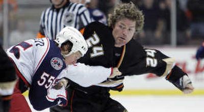 
Anaheim's Brad May, right, fights with Columbus' Ole-Kristian Tollefsen.Associated Press
 (Associated Press / The Spokesman-Review)