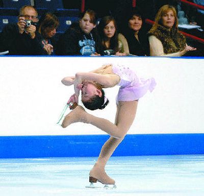 
Caroline Zhang performs her Junior Ladies' short program at the Spokane Arena. She's in second place. 
 (Dan Pelle / The Spokesman-Review)