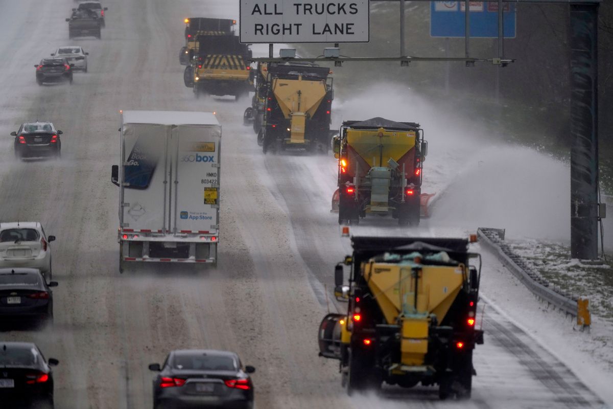 Vehicles navigate hazardous driving conditions along Interstate 85/40 as a winter storm moves through the area in Mebane, N.C., Sunday, Jan. 16, 2022.  (Gerry Broome)