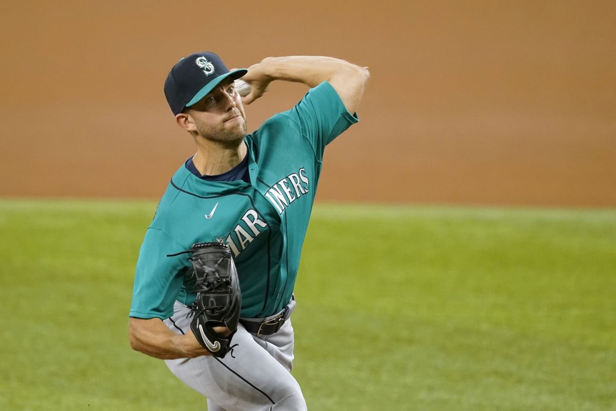 Seattle Mariners starting pitcher Tyler Anderson throws to a Texas Rangers batter during the first inning of a baseball game in Arlington, Texas, Tuesday, Aug. 17, 2021.  (Tony Gutierrez)