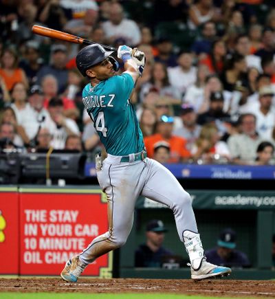 Seattle Mariners outfielder Julio Rodriguez singles in the fourth inning against the Houston Astros on Saturday at Minute Maid Park in Houston. Rodriguez set a MLB record with 17 hits in four games.  (Getty Images)