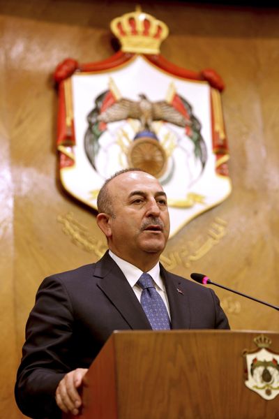 Turkish Foreign Minister Mevlut Cavusoglu, and Jordanian Foreign Minister Ayman Safadi, give a press conference in Amman, Jordan, Monday, Feb. 19, 2018. (Raad Adayleh / Associated Press)