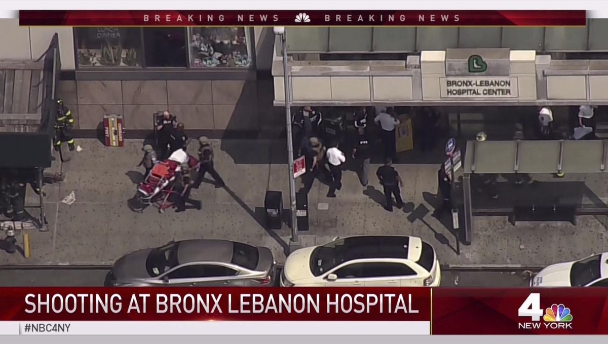 In this image taken from video provided by WNBC 4 New York, emergency personnel converge on Bronx Lebanon Hospital in New York, after a gunman opened fire there on Friday, June 30, 2017. (NBC 4 New Yo)