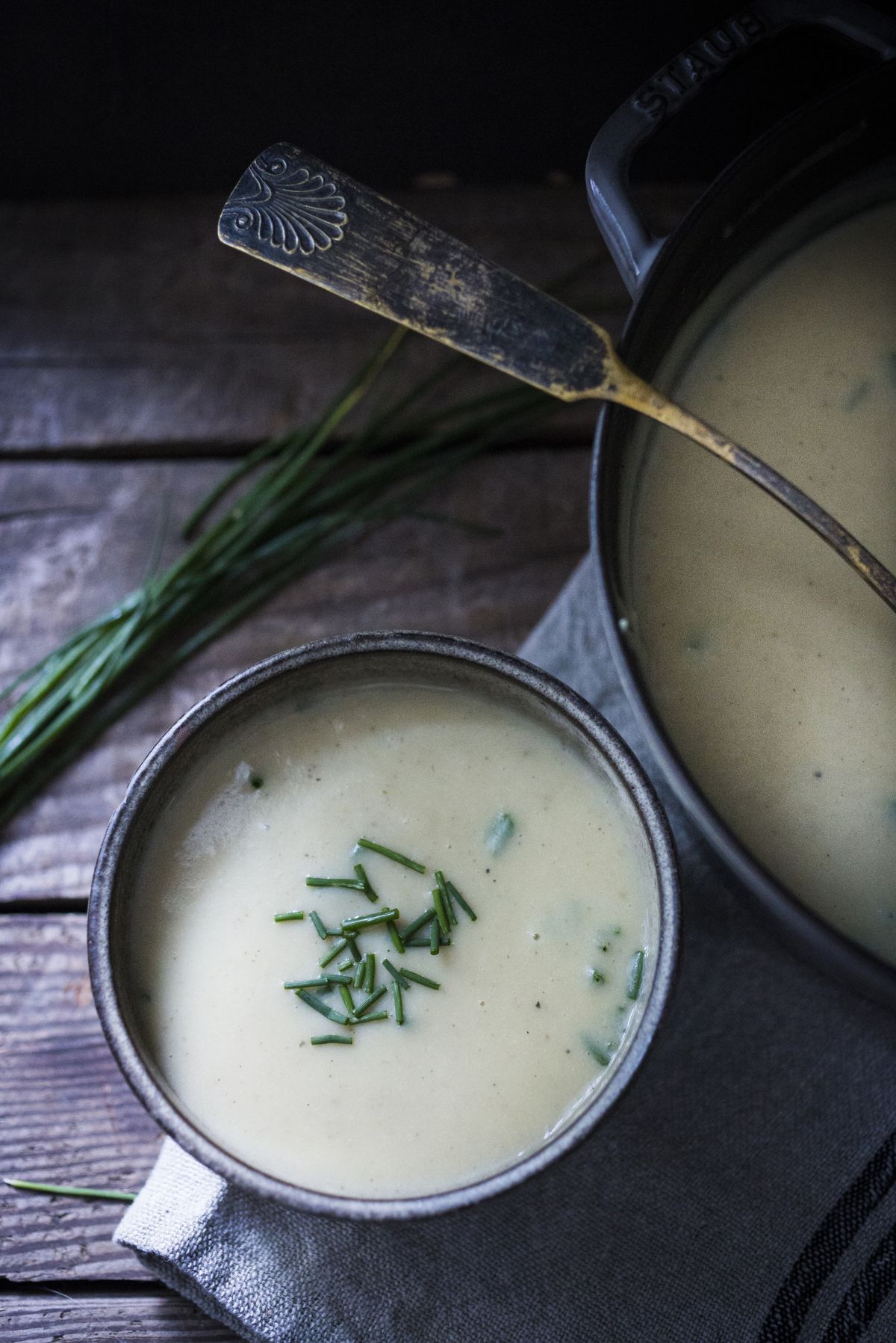 Potatoes, comforting and healthy, are the key ingredient in this lightened-up version of potato leek soup, in which butter and cream are replaced with olive oil and light sour cream.