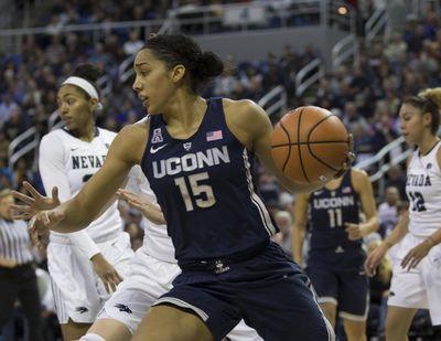 Connecticut's Gabby Williams drives the baseline against Nevada in the first half of an NCAA college basketball game in Reno, Nev. Tuesday, Nov. 28, 2017. Williams grew up in the Reno-Sparks area and was a standout player at Reed High School. (Tom R. Smedes / Associated Press)