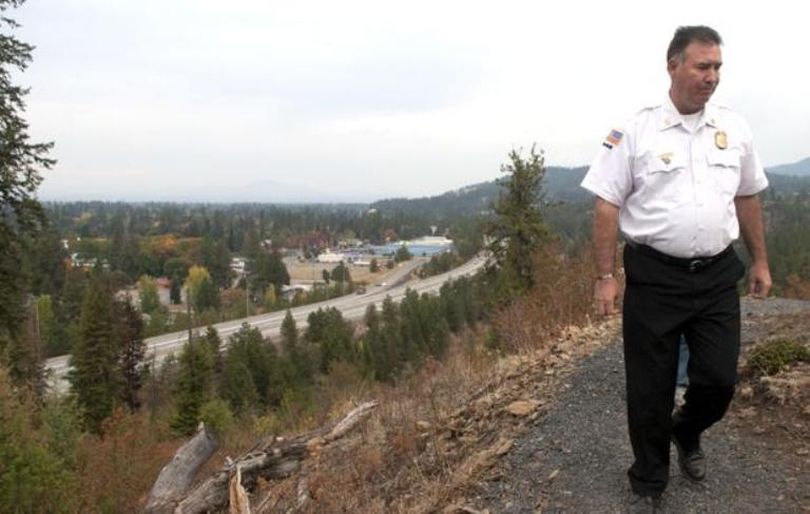 “It’s under investigation,” said Kenneth Gabriel, Fire Chief for City of Coeur d’Alene as he walked away from the scene in Coeur d’Alene where a body was found near a small brush fire on Potlatch Hill Road on Thursday, October 1, 2015. 