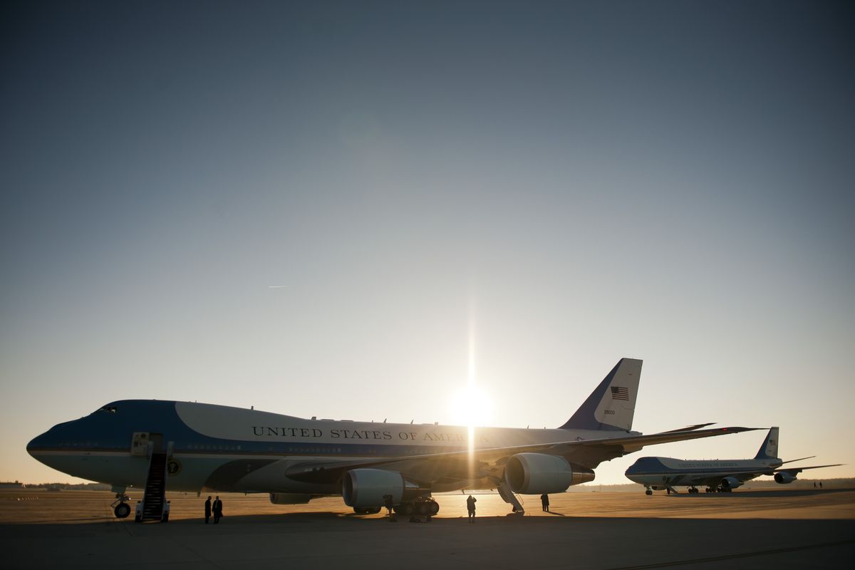Air Force One, left, and the back-up aircraft, await the arrival of President Barack Obama at Andrews Air Force Base, Md. at sunrise, Saturday, Nov. 17, 2012, for his trip to Southeast Asia. (Cliff Owen / Fr170079 Ap)