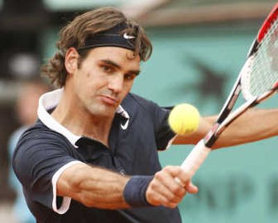 
Roger Federer struggled but will play Rafael Nadal in the French Open final for the third straight year. Associated Press
 (Associated Press / The Spokesman-Review)