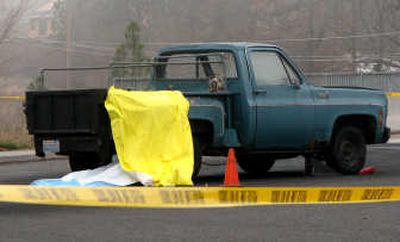 
A pedestrian was trapped under the wheel well of a pickup and killed Tuesday morning in west Spokane. 
 (Amy Cannata / The Spokesman-Review)