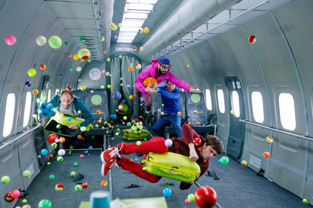 OK Go performs in zero gravity in this scene from the music video for “Upside Down and Inside Out.” (Courtesy of Jim Flanagan)
