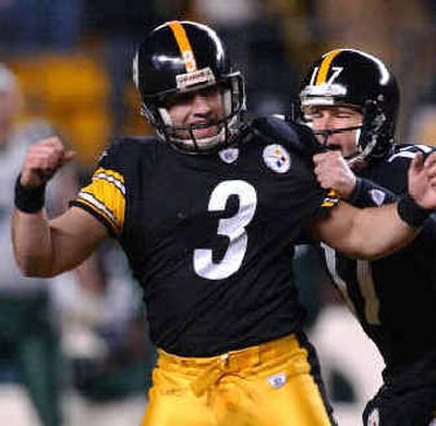 
Steelers kicker Jeff Reed (3) celebrates with holder Chris Gardocki after the game-winner.
 (Associated Press / The Spokesman-Review)
