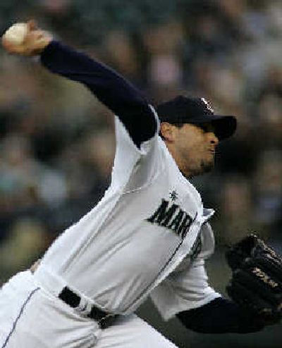 
Mariners starting pitcher Joel Pineiro carried a shutout into the sixth inning. 
 (Associated Press / The Spokesman-Review)