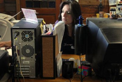 
Columbia Basin Knot Co. office manager Amanda Miller answers inquiries by phone and Internet from all over the world at the company's headquarters in Freeman. 
 (Holly Pickett / The Spokesman-Review)