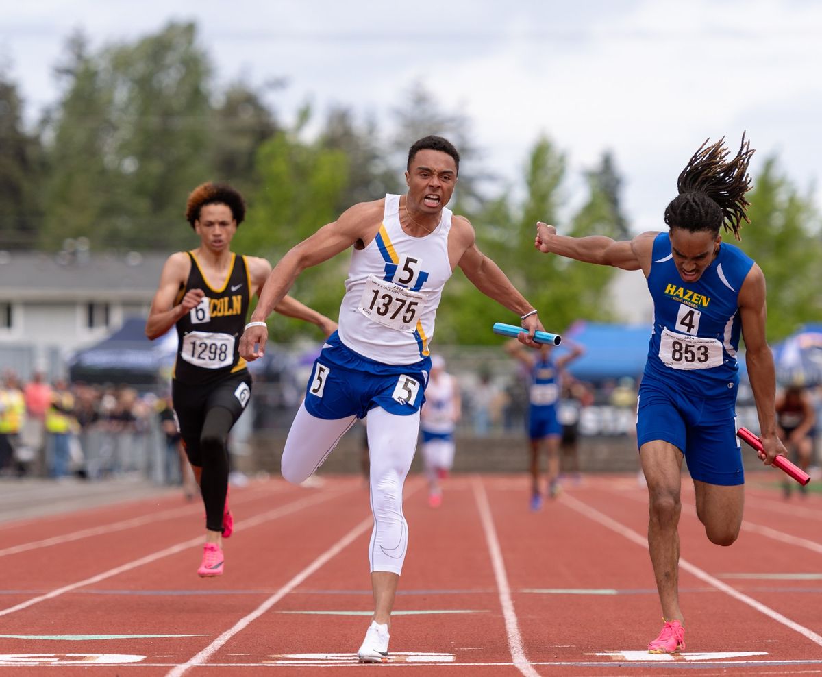 Mead’s Dominick Corley stretches for the finish line in helping the Panthers win the State 3A boys 4x100 relay in 41.84 seconds Saturday at Mount Tahoma High School in Tacoma.  (Joshua Hart/For The Spokesman-Review)
