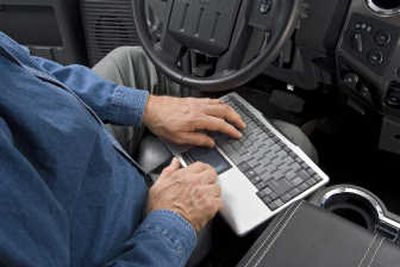 
In a photo provided by Ford Motor Co., an in-dash computer is shown in use. The automaker will offer the in-dash computer with high-speed Internet access and a battery-powered inkjet printer on its F-150 pickups and commercial vans. Associated Press
 (Associated Press / The Spokesman-Review)