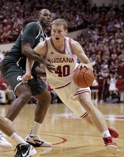 Indiana forward Cody Zeller, who scored 18 points in victory, drives around Michigan State center Derrick Nix. (Associated Press)