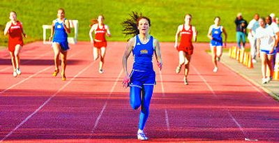 
Mead junior Nikki Codd leads the pack in a 400-meter race. 
 (File / The Spokesman-Review)