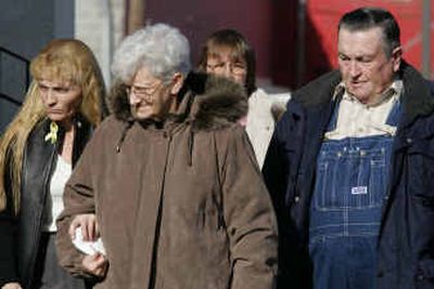
Becky Harper, left, mother of Bobbie Jo Stinnett, and grandparents Patty, center, and Gene Day, arrive at the Price Funeral Home on Tuesday afternoon,  in Maryville, Mo., for funeral services for Stinnett.   
 (Associated Press / The Spokesman-Review)