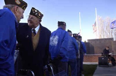 
World War II veterans George Cramer, left, and Jim Tuttle, second from left, joke Thursday about the cold at the dedication of the Rathdrum Veterans Memorial.World War II veterans George Cramer, left, and Jim Tuttle, second from left, joke Thursday about the cold at the dedication of the Rathdrum Veterans Memorial.
 (Jesse Tinsley/Jesse Tinsley/ / The Spokesman-Review)