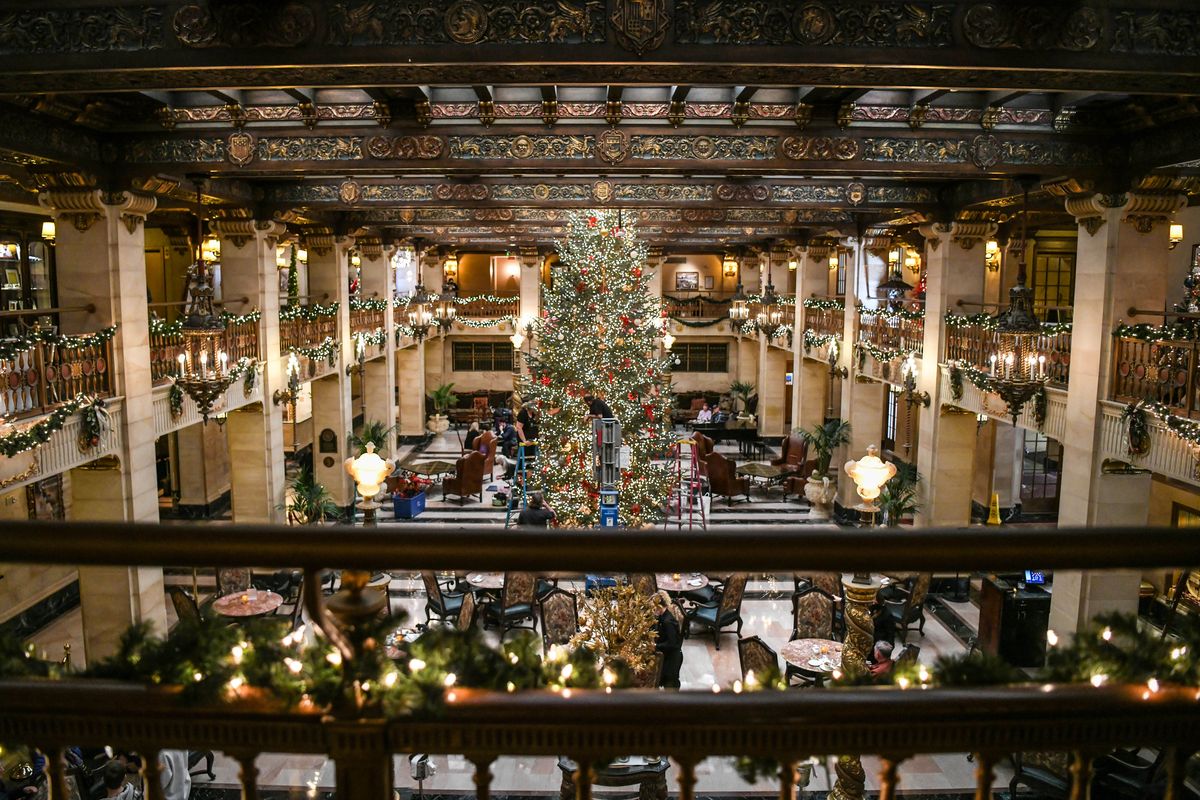 The lobby and the second floor at the Historic Davenport are transformed into holiday cheer for the 2021 Christmas Tree Elegance earlier this month.  (Dan Pelle/The Spokesman-Review)