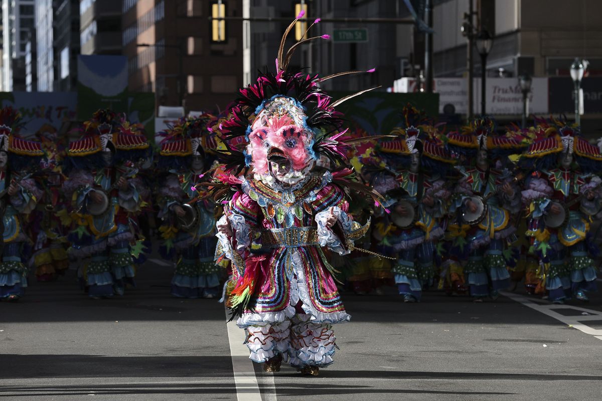 Joe Pomante, captain of the Durning String Band, marches on Wednesday in the Mummers Parade with the theme of “A Wild Time in Rio”.  (David Maialetti/The Philadelphia Inquirer/TNS)
