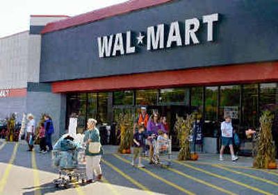 
Wal-Mart must pay $11 million to settle federal probe into its use of illegal immigrants to clean floors at stores in 21 states.
 (Associated Press / The Spokesman-Review)