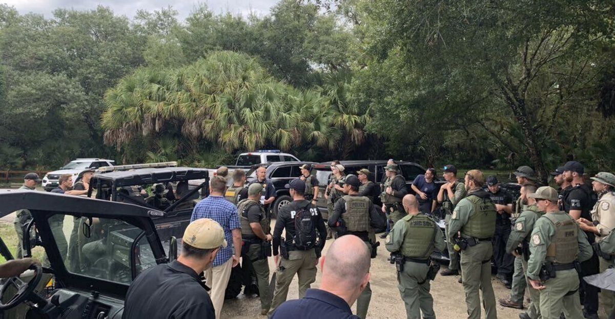 This photo provided by North Port Police Department, law enforcement officials conduct a search of the vast Carlton Reserve in the Sarasota, Fla., area for Brian Laundrie on Saturday, Sept. 18, 2021. Laundrie is a person of interest in the disappearance of his girlfriend, Gabrielle “Gabby” Petito.  (HOGP)