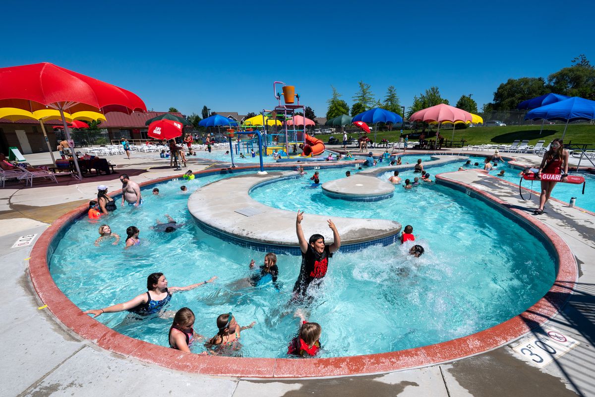 After being closed for nearly two years, the Southside Family Aquatics Facility has reopened just in time to help take the edge off the current heat wave. The Spokane County-run center features two new curly slides, more shade umbrellas and concessions run by the Spokane Indians baseball organization.  (COLIN MULVANY/THE SPOKESMAN-REVIEW)