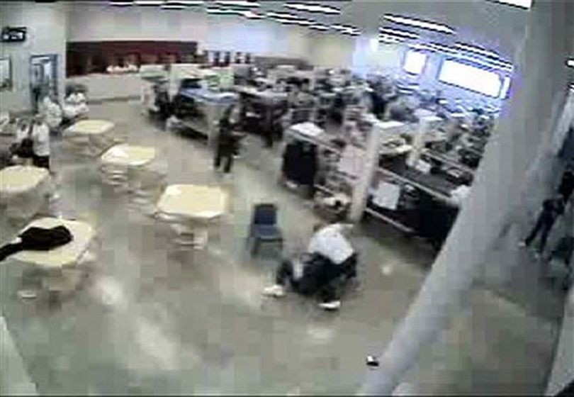 In a frame grab from video obtained by The Associated Press, an inmate attacks fellow inmate Hanni Elabed at the privately-run Idaho Correctional Center just south of Boise, Idaho. Elabed suffered brain damage and persistent short-term memory loss after he was beaten by inmate James Haver while multiple guards watched at the Idaho prison operated by Corrections Corporation of America.  ((AP Photo))