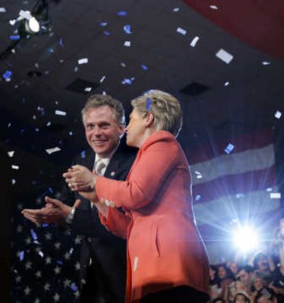 
Hillary Rodham Clinton celebrates with campaign chairman Terry McAuliffe at her West Virginia primary night victory event in Charleston. Associated Press
 (Associated Press / The Spokesman-Review)