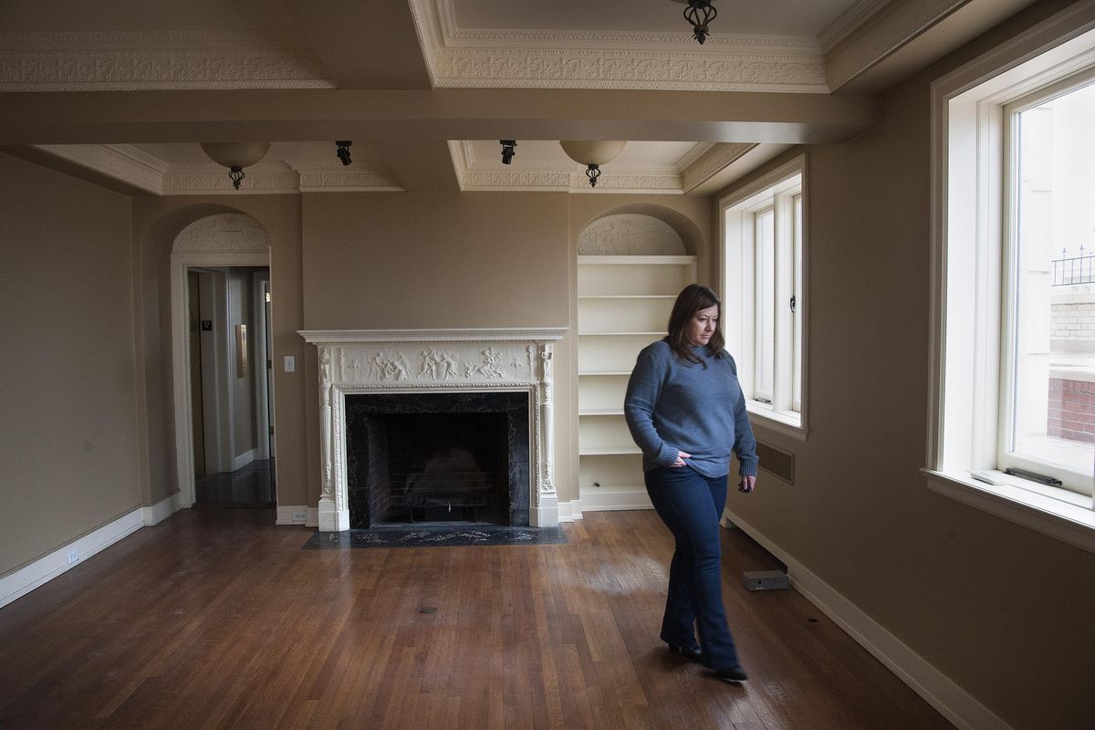 Scarlett Stalter, Paulsen Center assistant property manager, gives a tour of the building’s penthouse suite living room, Dec. 4, 2015, in downtown Spokane. The Paulsen Center is looking for a tenant for the former long-time home of Helen Paulsen. (Dan Pelle / The Spokesman-Review)