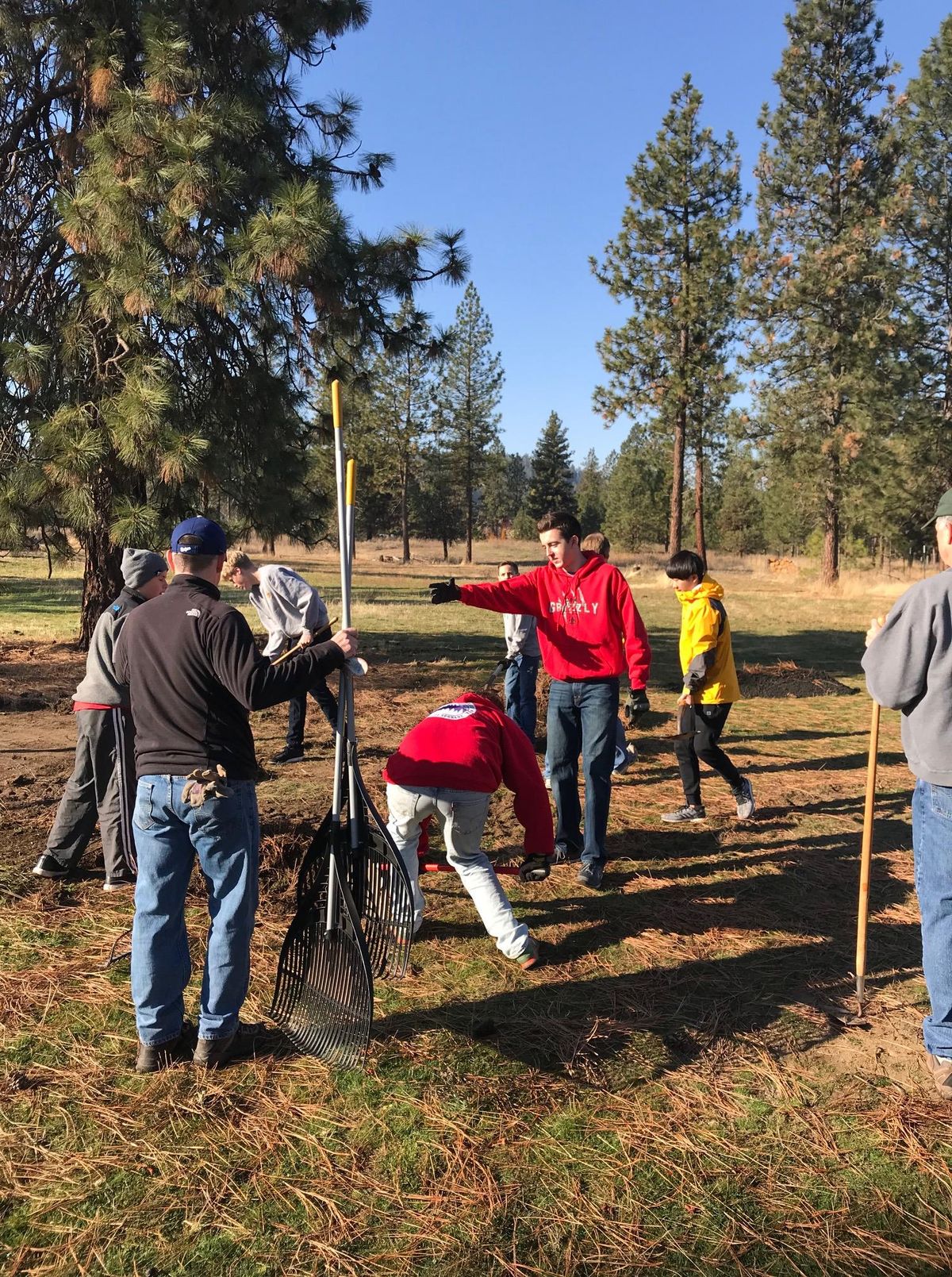 Brandon Brewer supervises volunteers during his Eagle Scout project at River’s Wish Animal Sanctuary in northwest Spokane. The group built a tool shed for the animal shelter. (Brandon Brewer / Courtesy)