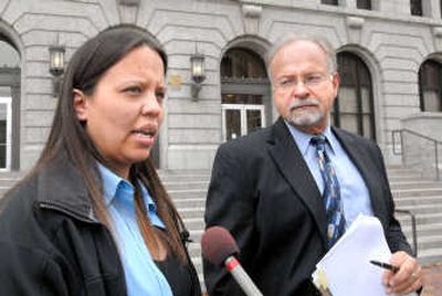 
Jammie Thomas, who is accused of sharing music online in violation of copyrights, and her lawyer, Brian Toder, talk outside the Federal Courthouse in Duluth, Minn., on Tuesday. Associated Press photos
 (Associated Press photos / The Spokesman-Review)